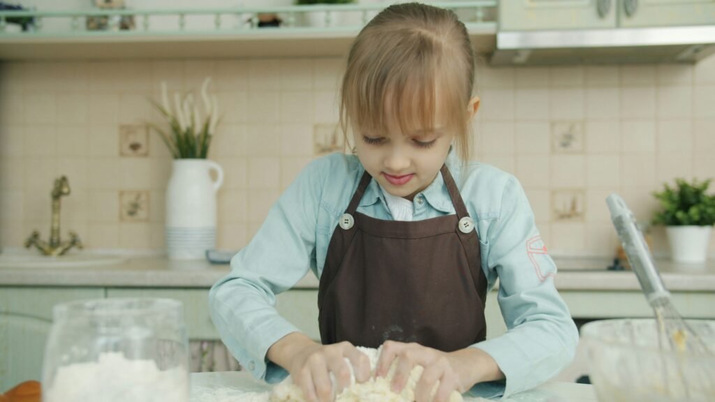 Family cooking together, preparing Thanksgiving dinner with faith and joy
